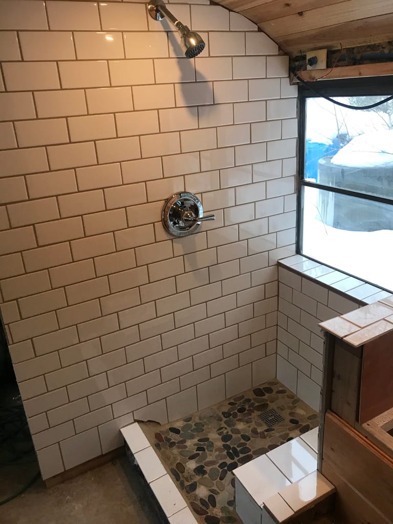 How to Build a Stunning Tiled Skoolie Shower with a Mortar Shower Pan