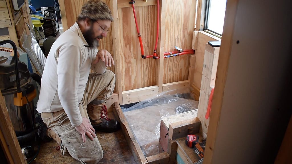 How to Build a Stunning Tiled Skoolie Shower with a Mortar Shower Pan